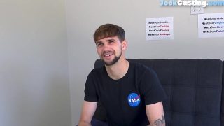 Tattooed casting jock tugs his long cock